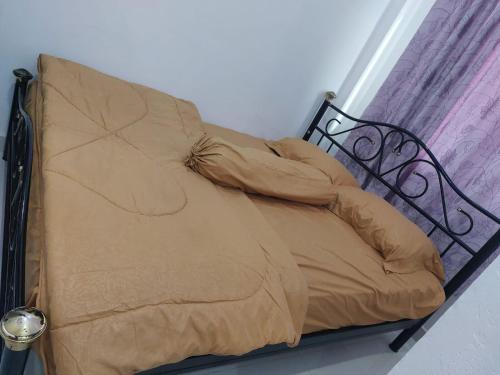 Cama o camas de una habitación en Wisma Raudah Wakatobi