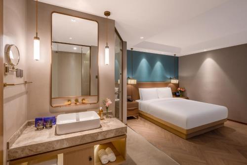 Koupelna v ubytování Qingdao Xinduxin Manxin Hotel