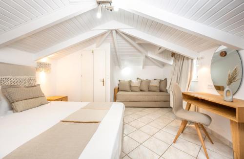 Postel nebo postele na pokoji v ubytování Spiros Family Apts