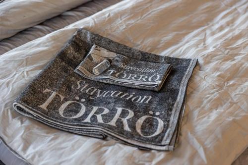 En eller flere senge i et værelse på Staycation Törrö Kirkkoväärti as 7