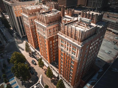 an overhead view of a tall building in a city at The Skirvin Hilton Oklahoma City in Oklahoma City