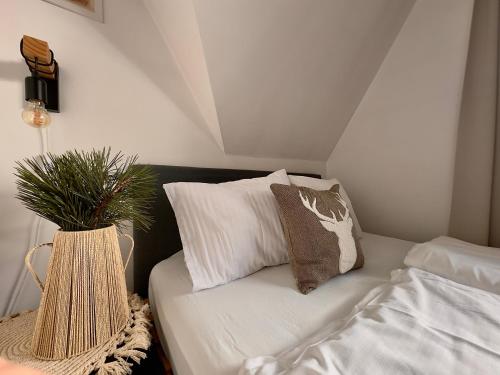 Ένα ή περισσότερα κρεβάτια σε δωμάτιο στο Dom na Wierchu