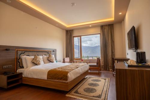 Ένα ή περισσότερα κρεβάτια σε δωμάτιο στο The Lhababs Ladakh