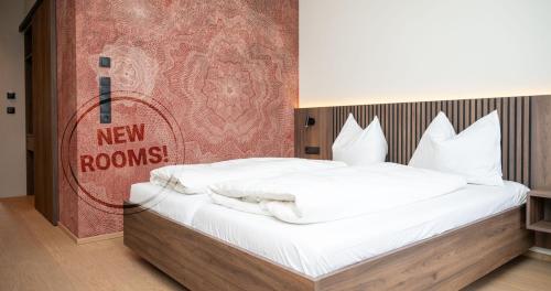 Postel nebo postele na pokoji v ubytování Schäfle Feldkirch-Altenstadt