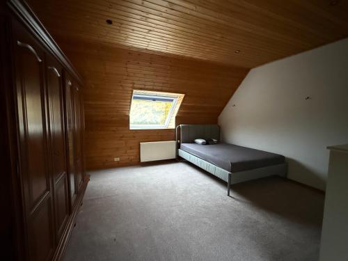 Postel nebo postele na pokoji v ubytování zandhoven vila