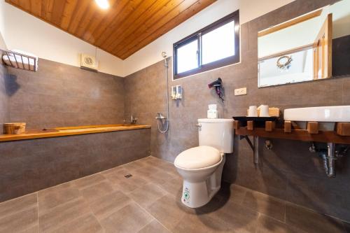 Koupelna v ubytování 宜蘭閑居民宿