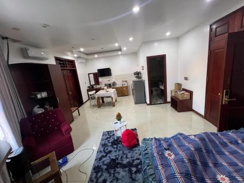 Ένα ή περισσότερα κρεβάτια σε δωμάτιο στο Hoàng Phương Hotel