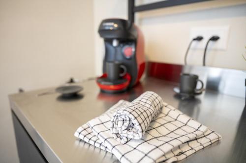 a kitchen counter with aaid napkin on a kitchen counter sidx sidx at Studio Nuna EG in Ardez