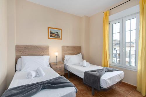 En eller flere senge i et værelse på Canela Park by Ĥ - Playa Isla Canela ICHP34P3