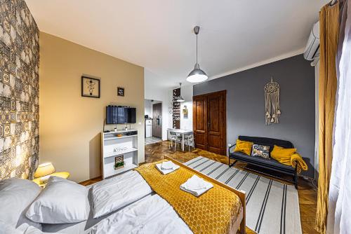 Ένα ή περισσότερα κρεβάτια σε δωμάτιο στο Colors Apartments