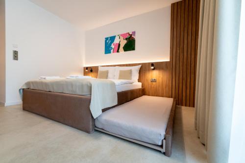 Ένα ή περισσότερα κρεβάτια σε δωμάτιο στο FiVe Penzion