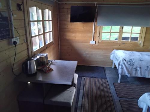 Ένα ή περισσότερα κρεβάτια σε δωμάτιο στο Moonlight View