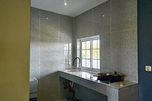 Η κουζίνα ή μικρή κουζίνα στο La FAHNIENTE