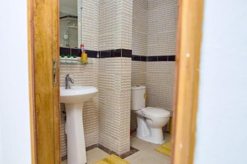 Koupelna v ubytování Snob immo