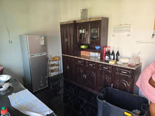 Η κουζίνα ή μικρή κουζίνα στο Chidenguele Beach House