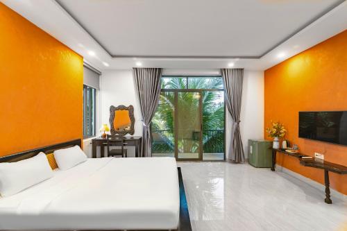 Et tv og/eller underholdning på Vooc Signature Hotel Hoi An