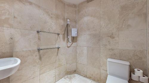 Ένα μπάνιο στο Finest Retreats - Garden Cottage at Ormidale House