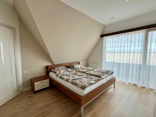 Postel nebo postele na pokoji v ubytování Familiehuis Pollux 6 personen Noordwijk aan Zee