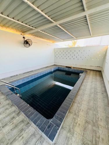 Πισίνα στο ή κοντά στο ABUCHO Holiday Homes - Ras Al Khaimah UAE