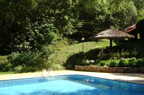 Piscina en o cerca de Pousada Passaredo Montanha