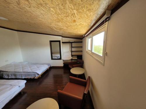 Ένα ή περισσότερα κρεβάτια σε δωμάτιο στο middle path