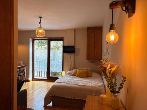 Ένα ή περισσότερα κρεβάτια σε δωμάτιο στο Tu rincón rústico con balcón y vistas - Erta 2