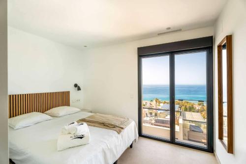 Ένα ή περισσότερα κρεβάτια σε δωμάτιο στο Luxury House with Private Pool, Jacuzzi and Wellness Spa