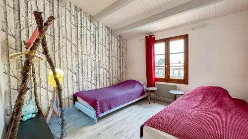 Et opholdsområde på Superbe villa avec piscine chauffée