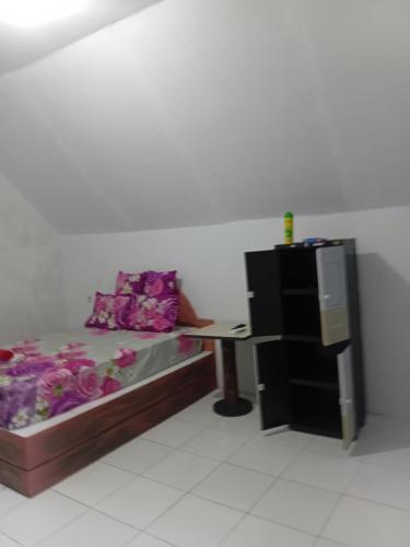 Postel nebo postele na pokoji v ubytování Regina Cottage