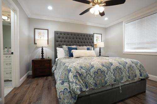 Ένα ή περισσότερα κρεβάτια σε δωμάτιο στο 4 bedroom, 3 bathrooms Pool Home