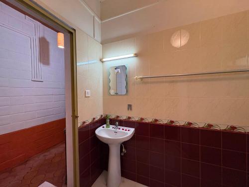 Ένα μπάνιο στο Kuzhupilly Beach House