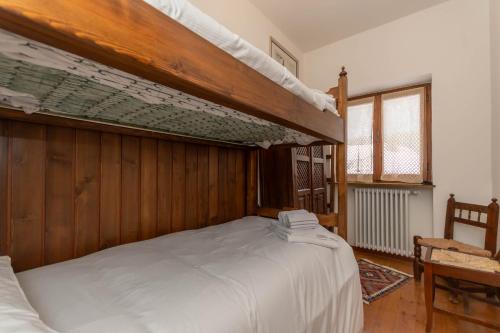 Ένα ή περισσότερα κρεβάτια σε δωμάτιο στο El Barance-Boscoverde 2