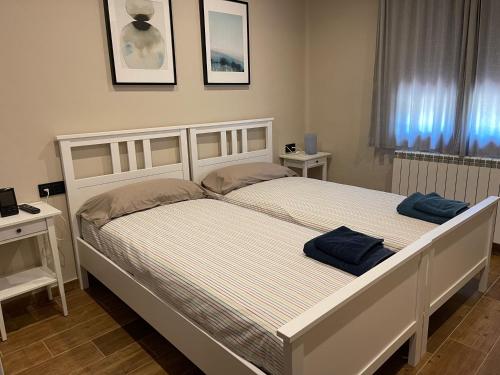 Ένα ή περισσότερα κρεβάτια σε δωμάτιο στο Casa Calvés