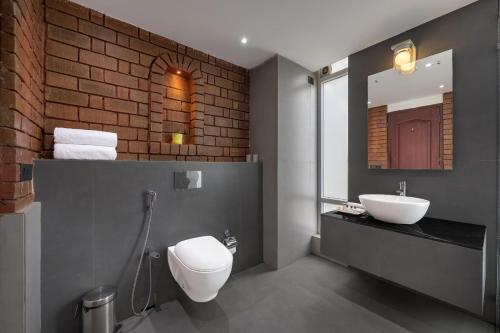 Et badeværelse på Kia Inn Boutique Hotel