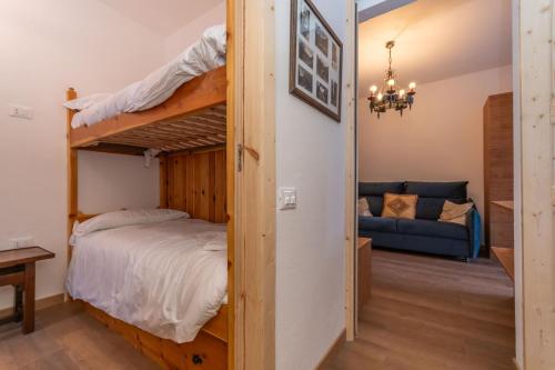 Ένα ή περισσότερα κρεβάτια σε δωμάτιο στο El Mugo-Boscoverde 1