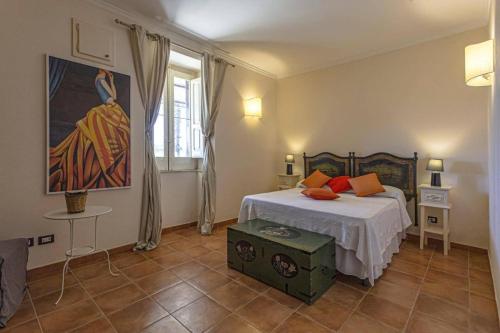 Ένα ή περισσότερα κρεβάτια σε δωμάτιο στο Villa Castelluccio Noto con piscina