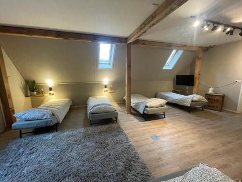 Ένα ή περισσότερα κρεβάτια σε δωμάτιο στο Landgoed Bekspring