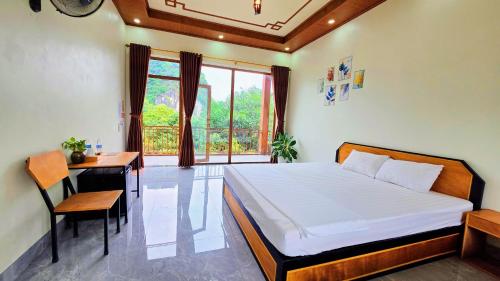 Ένα ή περισσότερα κρεβάτια σε δωμάτιο στο Ninh Binh Kong's Homestay