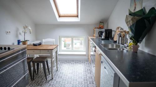 Η κουζίνα ή μικρή κουζίνα στο Nomad Home - Bronckart 10