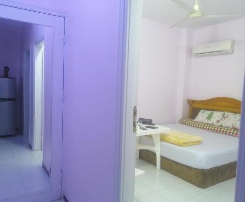 Vuode tai vuoteita majoituspaikassa Loyalty apartment