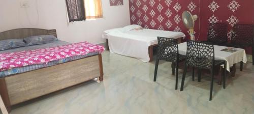 Shobuj Kutir সবুজ কুটির客房内的一张或多张床位