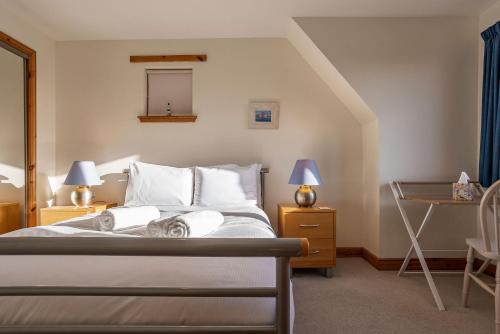 En eller flere senge i et værelse på Sparrows - Crail