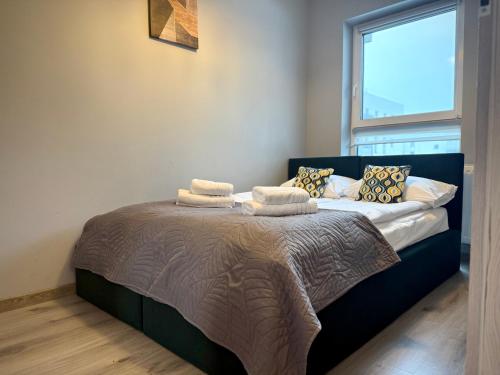 Ένα ή περισσότερα κρεβάτια σε δωμάτιο στο Prywatny Parking Cozy Place by Rentoom