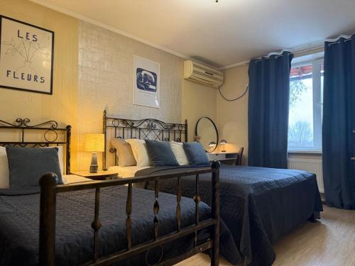 Ένα ή περισσότερα κρεβάτια σε δωμάτιο στο Home Boutique Hotel