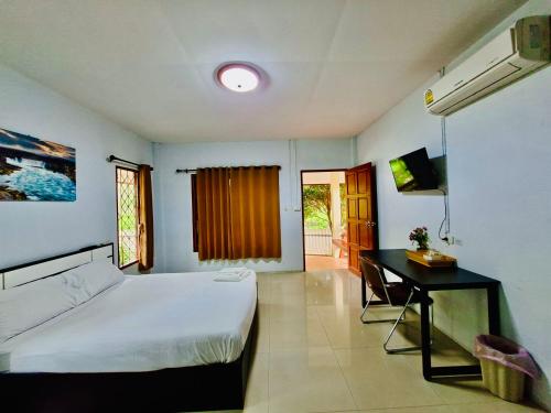 Postel nebo postele na pokoji v ubytování Cocoloco bungalow