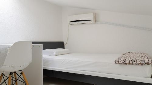 Ένα ή περισσότερα κρεβάτια σε δωμάτιο στο VD Apartment