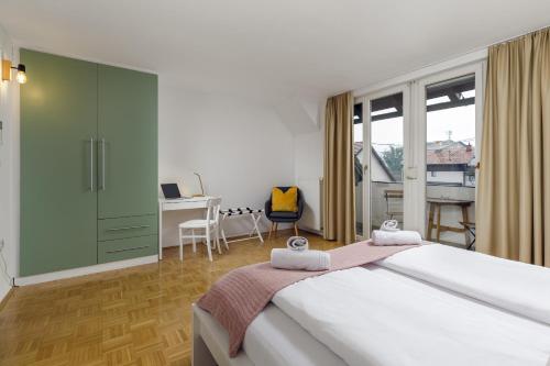 Ένα ή περισσότερα κρεβάτια σε δωμάτιο στο Cozy house close to Ljubljana center