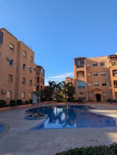 Φωτογραφία από το άλμπουμ του Appartement à 5 min de la plage, piscine et parking privé σε Ben Slimane