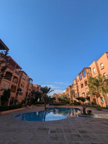 Φωτογραφία από το άλμπουμ του Appartement à 5 min de la plage, piscine et parking privé σε Ben Slimane