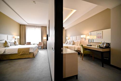 Giường trong phòng chung tại Ararat Resort Tsaghkadzor